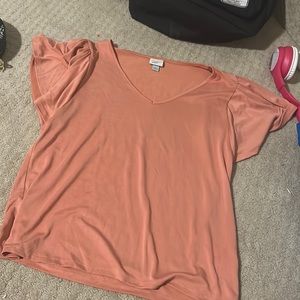 Orange ruffled sleeve top